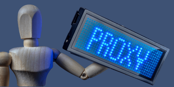Proxy, a robot is holding PROXY sign